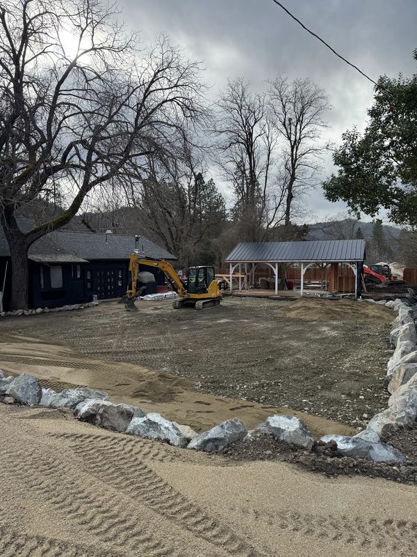 Graded and compacted base for a commercial parking area beside a new pavilion in Jacksonville, Oregon